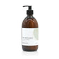 A 500ml fresh fig and apples scented hand and body lotion from the Home County Co. is shown in its eco-friendly amber glass bottle