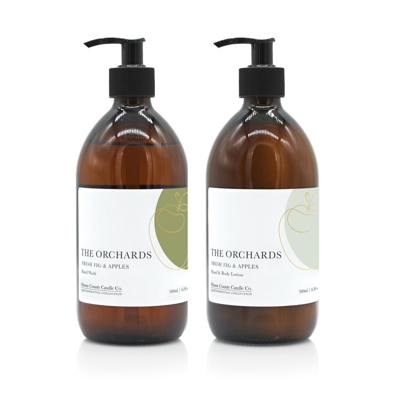 A 500ml fresh fig and green apples scented hand wash and lotion duo from the Home County Co. is shown in eco-friendly amber glass bottles