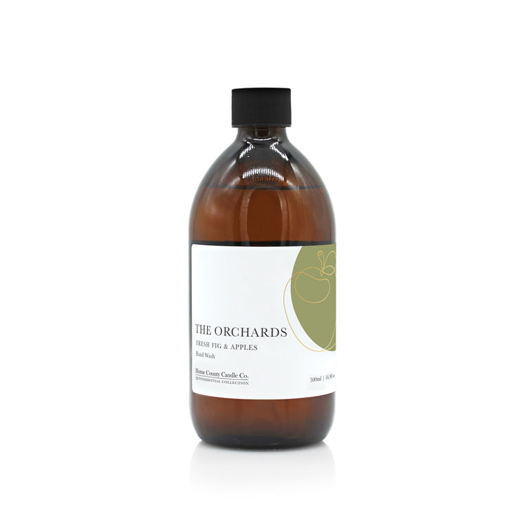 A 500ml fresh fig and apples scented liquid hand wash refill from the Home County Co. is shown in its eco-friendly amber glass bottle