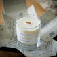 An Orkney Islands seaweed and samphire scented candle from the Home County Co is shown in its open box, revealing a map of the UK inside